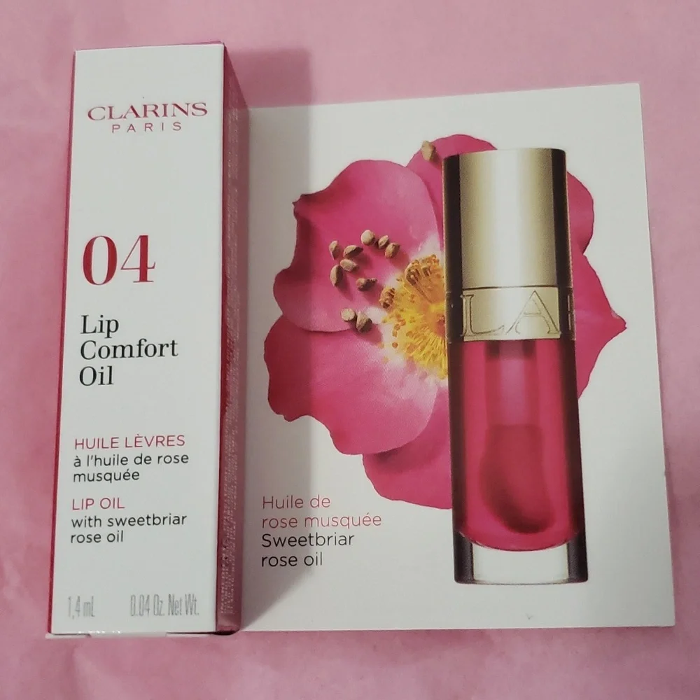 DELUXE CLARINS 04 LIP COMFORT OIL WITH SWEETBRIAR ROSE OIL.